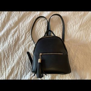 Black mini leather backpack